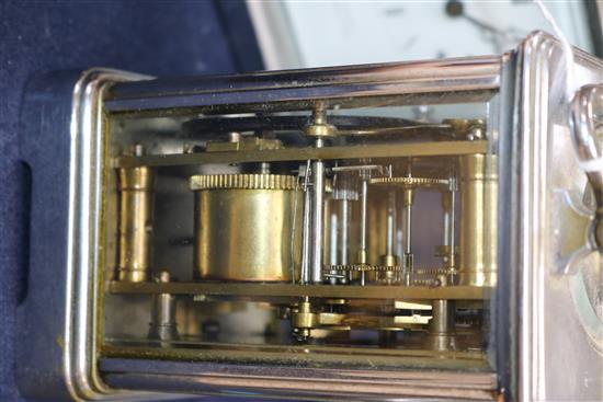 A French silvered brass carriage clock and a similar timepiece